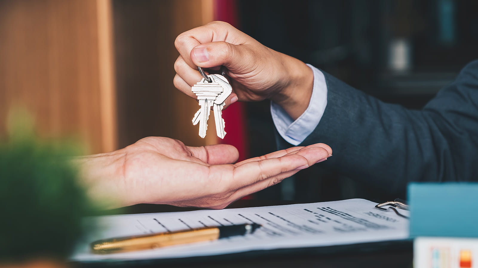 Handing-key-off.jpg Handing-key-off.jpg